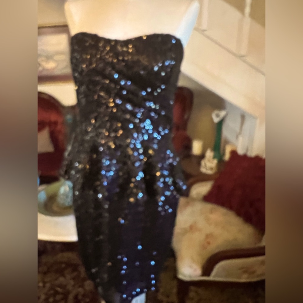 Stunning sequined mini dress. A must have for clubs parties wedding cruises etc